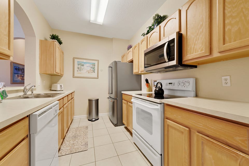 Fully Stocked Kitchen with Full Size Appliances, Cookware, Dishes and more.