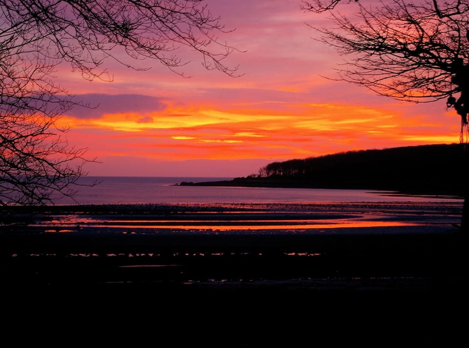 Sunrise over Rigg Bay (75m from Cottages) | Shore Cottage, Garlieston, near Newton Stewart