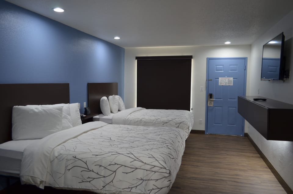 Standard Room, 2 Queen Beds, Non Smoking | Desk, laptop workspace, free WiFi, bed sheets
