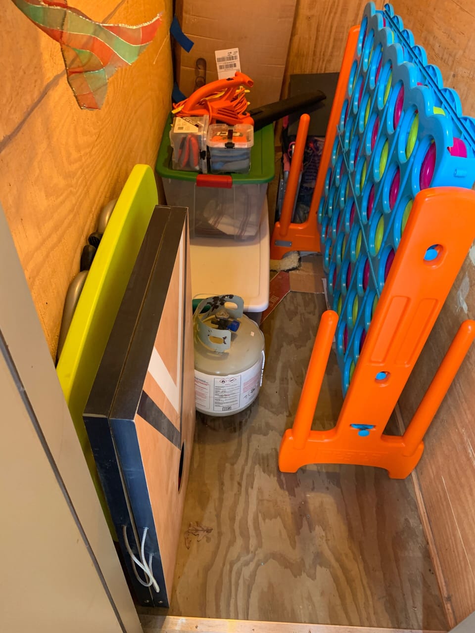 Folding picnic table for kids, corn hole, huge connect 4, and extra propane 