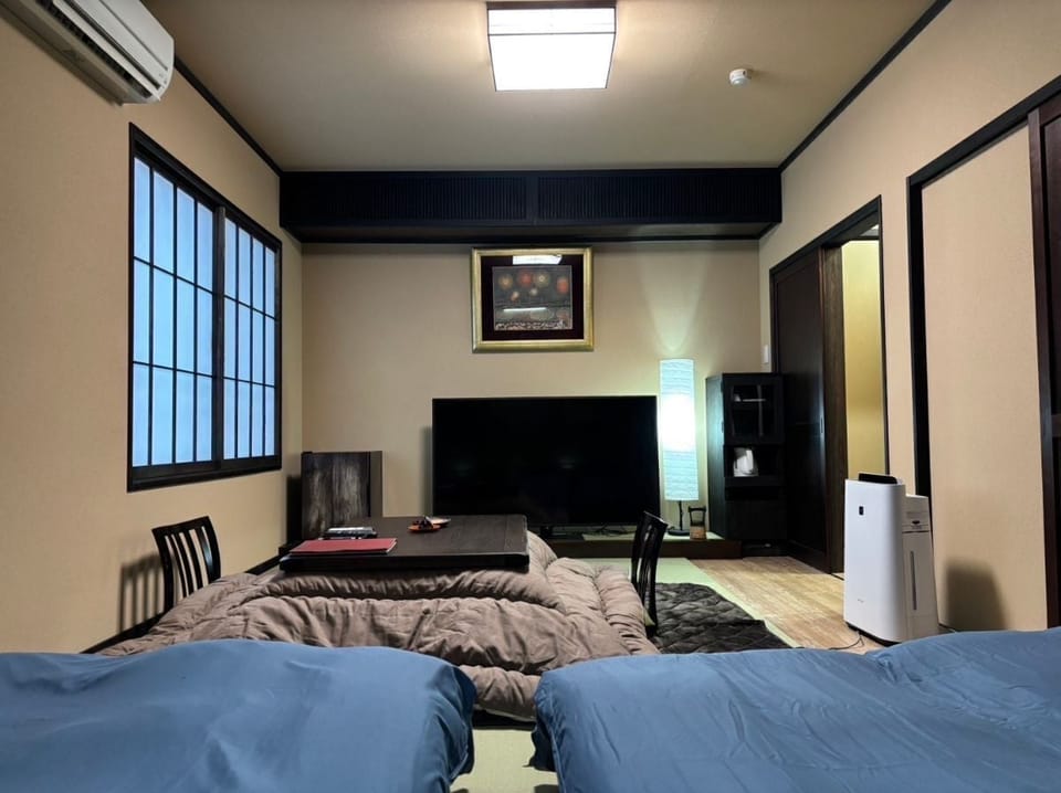 Family Room, Non Smoking (207,Japanese western, only shower) | In-room safe, individually decorated, individually furnished
