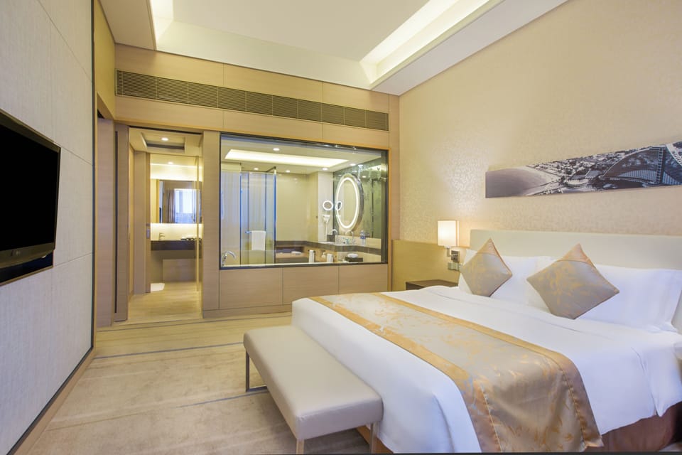 Premium bedding, down comforters, memory foam beds, minibar