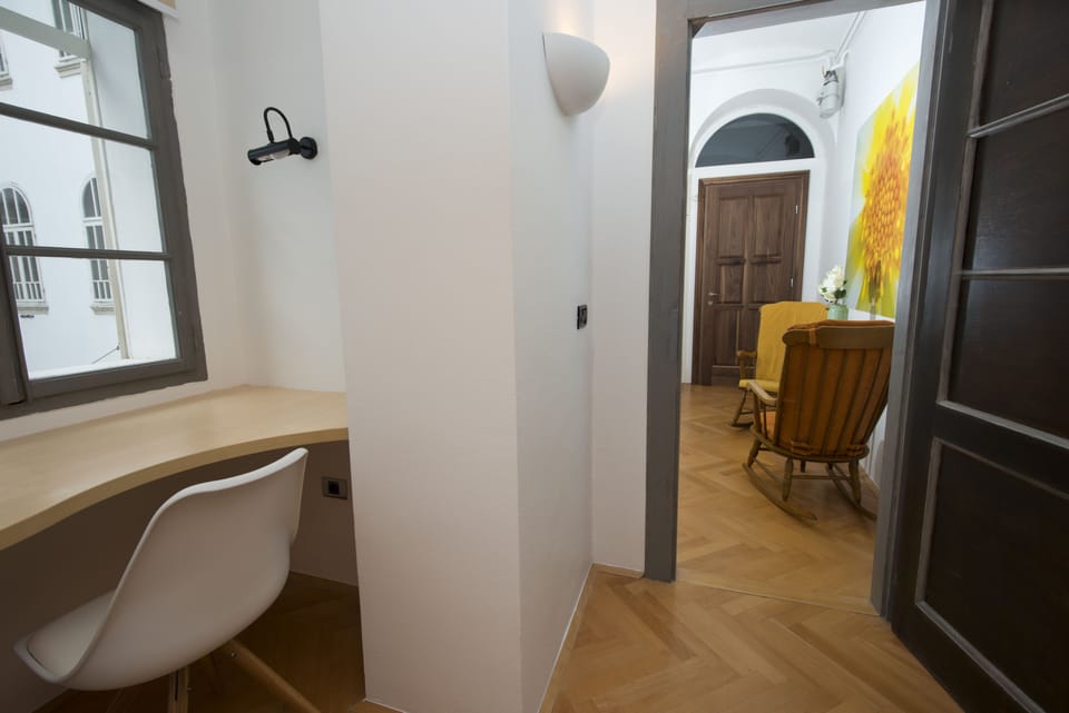 Economy Double Room | Living area | 42-inch LCD TV with cable channels, TV