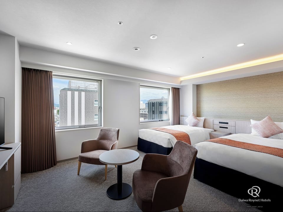 Premium bedding, down comforters, blackout drapes, free WiFi