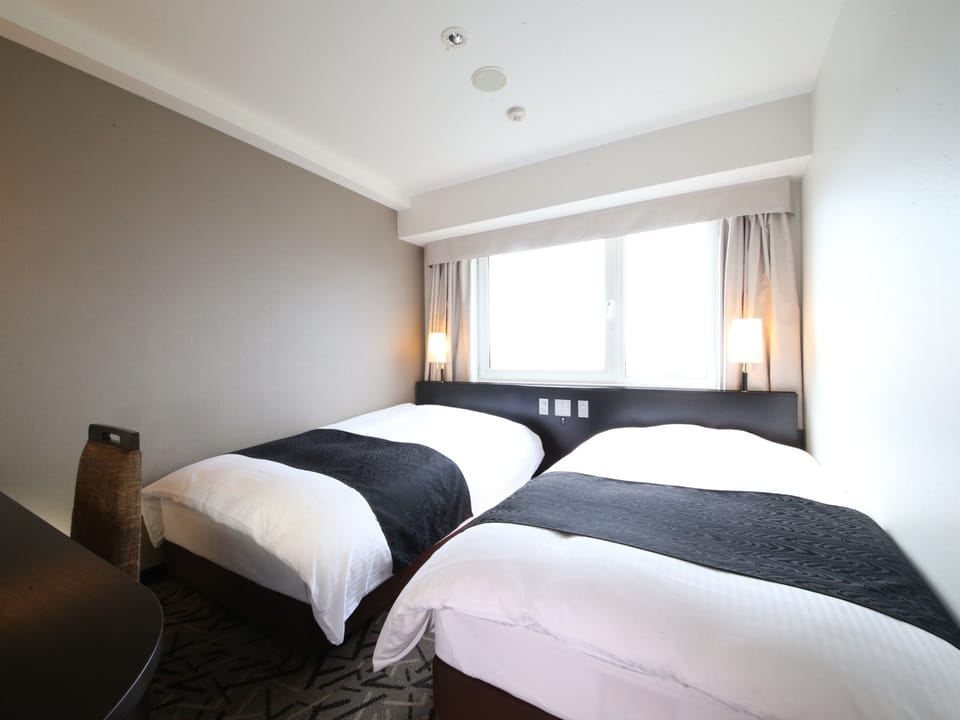 Down comforters, desk, free WiFi, bed sheets