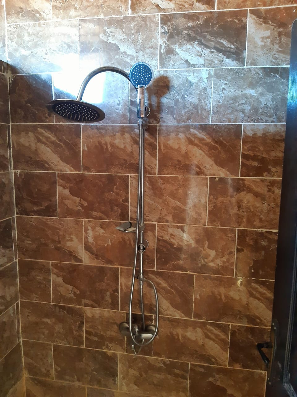 Shower, rainfall showerhead, towels