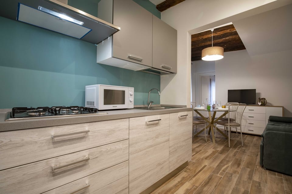 Apartment, 2 Bedrooms | Private kitchen | Full-size fridge, microwave, stovetop, dishwasher