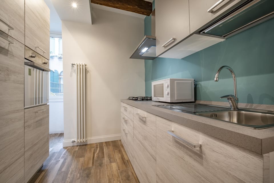 Apartment, 2 Bedrooms | Private kitchen | Full-size fridge, microwave, stovetop, dishwasher