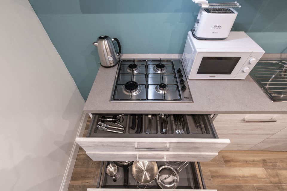 Apartment, 2 Bedrooms | Private kitchen | Full-size fridge, microwave, stovetop, dishwasher