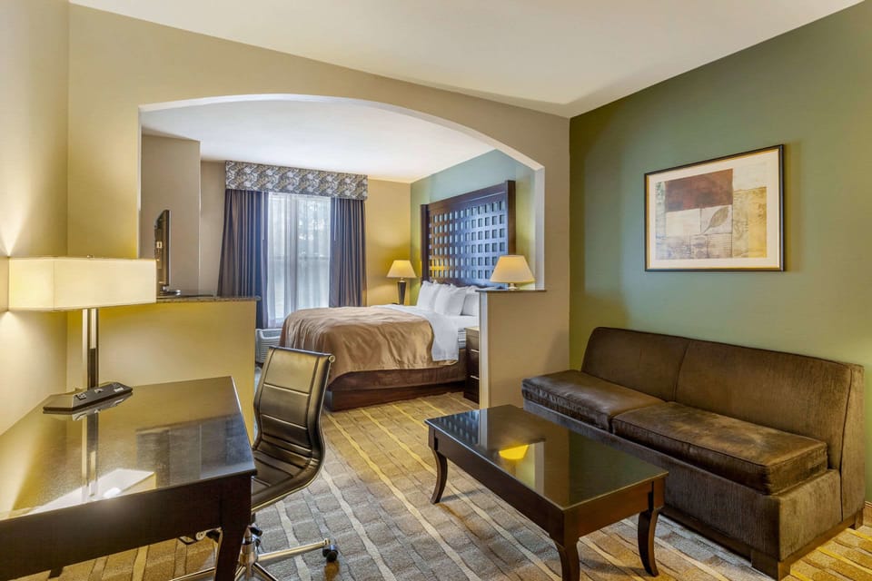 Suite, 1 King Bed with Sofa bed, Non Smoking | Desk, laptop workspace, blackout drapes, iron/ironing board
