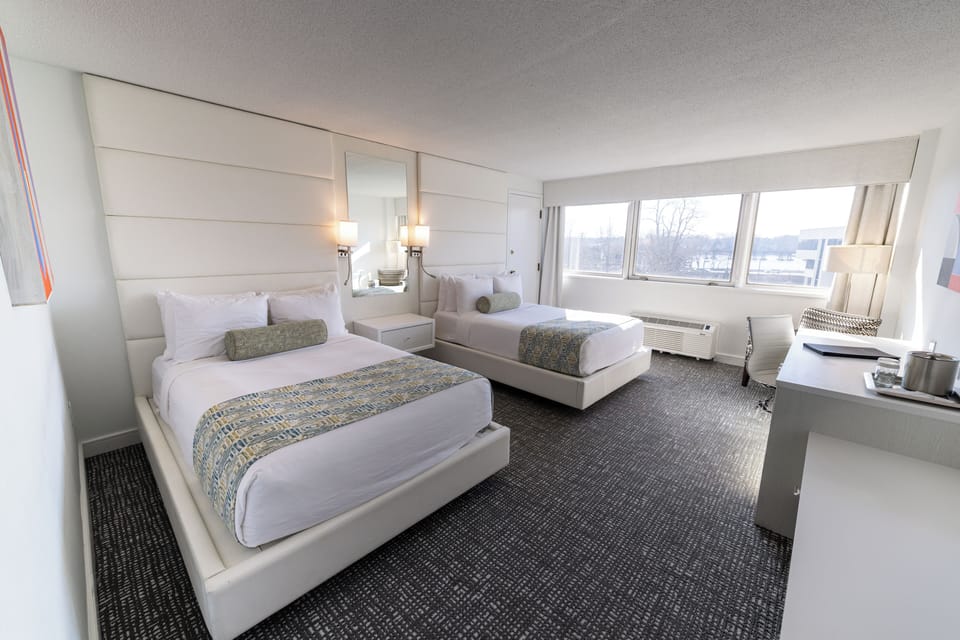 Deluxe Double Room, 2 Double Beds | Hypo-allergenic bedding, down comforters, in-room safe, blackout drapes