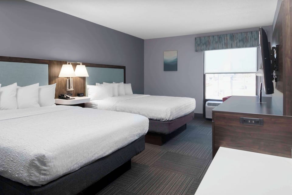 Two queen beds non smoking | In-room safe, iron/ironing board, free cribs/infant beds, free WiFi