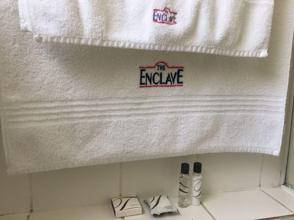Separate tub and shower, deep soaking tub, free toiletries, towels