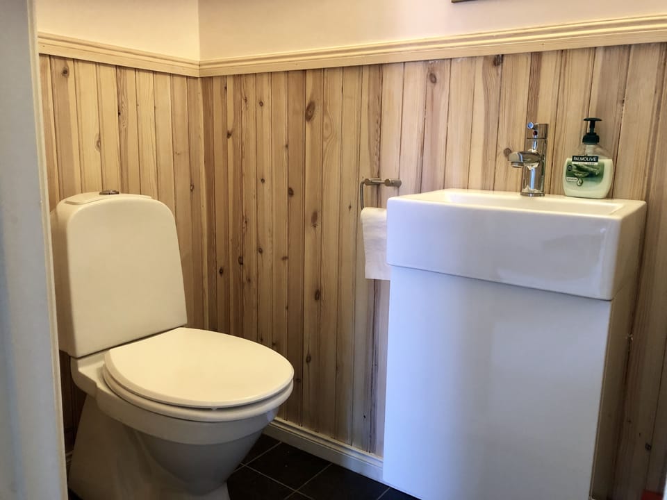 Standard Apartment, 1 Bedroom | Bathroom | Shower, hair dryer, slippers, towels