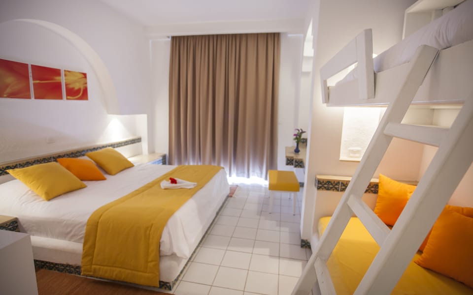 Standard Triple Room | Individually furnished, desk, blackout drapes, bed sheets