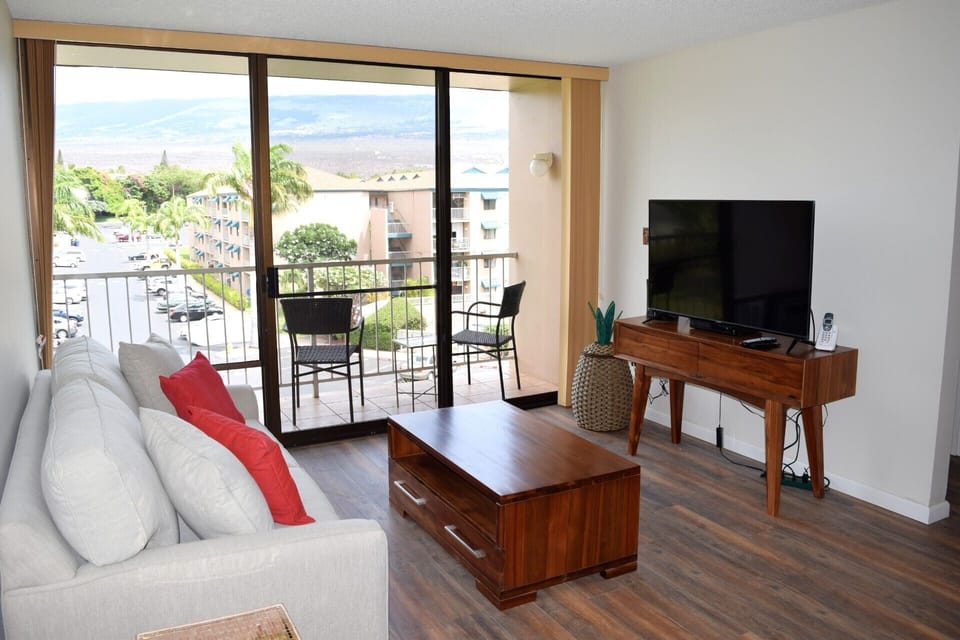 Living room opens to private lanai