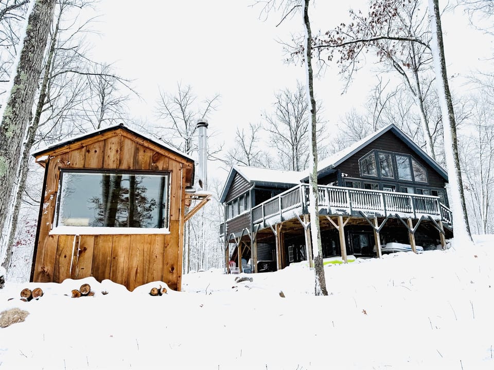 Our authentic wood burning sauna with a great view of the lake.