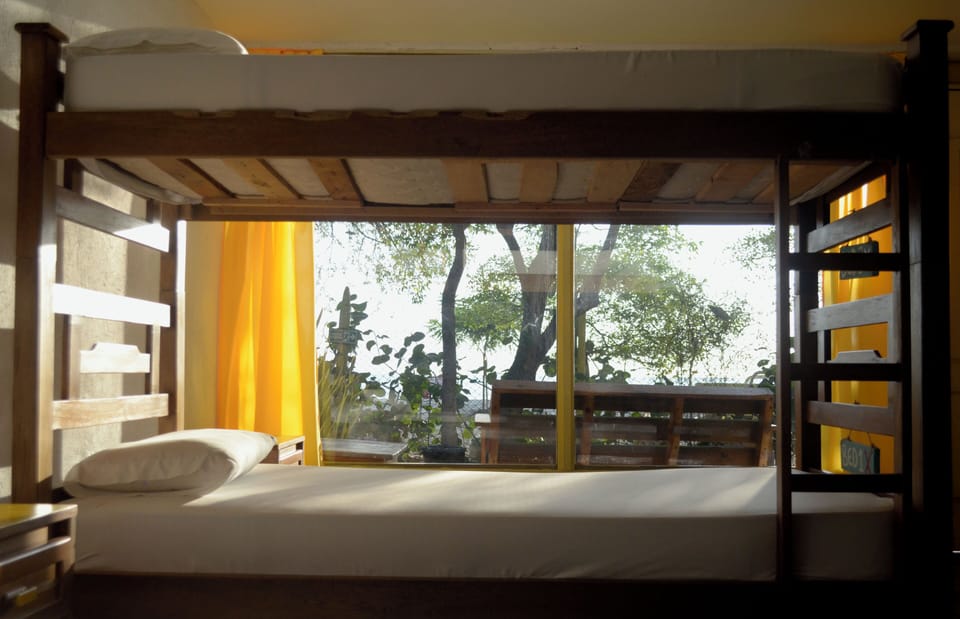 4 Bed Mix Shared Dorm | Premium bedding, desk, laptop workspace, blackout drapes