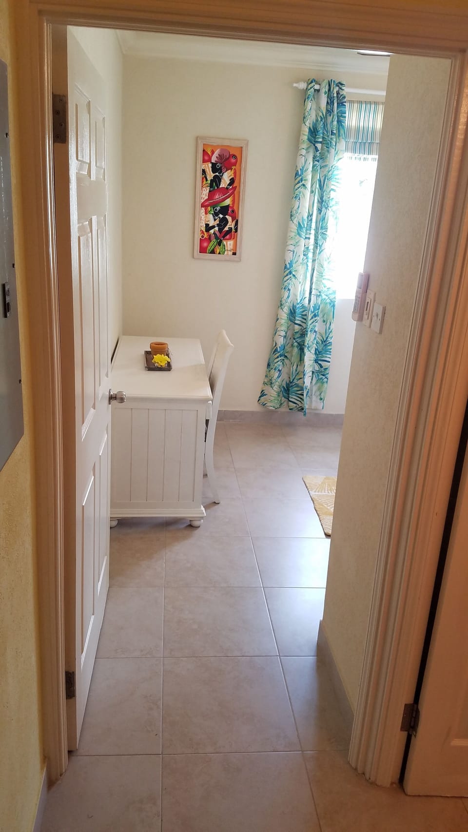 Ground floor bedroom featuring double bed, dressing table and fitted wardrobes 