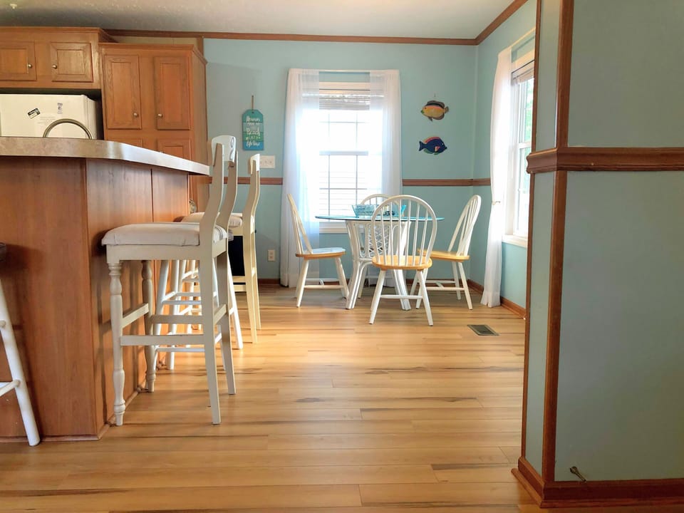 Dining area and kitchen breakfast bar.