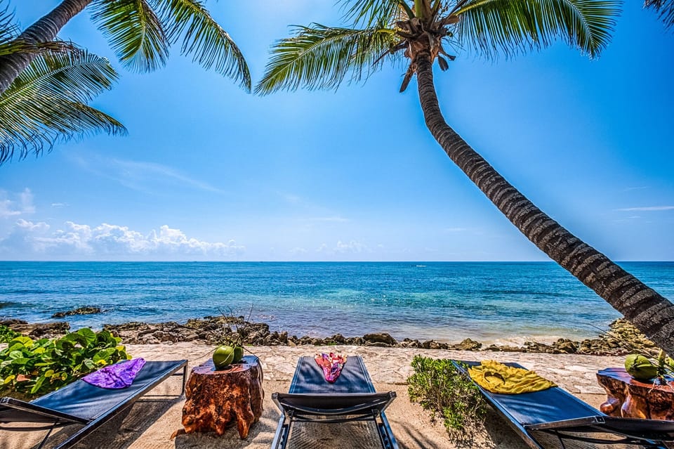 Beach loungers at Akumal's Jade beach - Casa Bella Akumal Mexico Vacation Rental