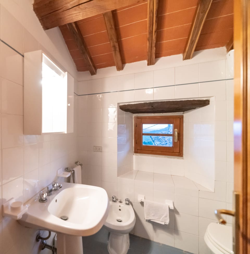 Apartment, 2 Bedrooms (Nocciolo) | Bathroom | Shower, bidet, towels, soap