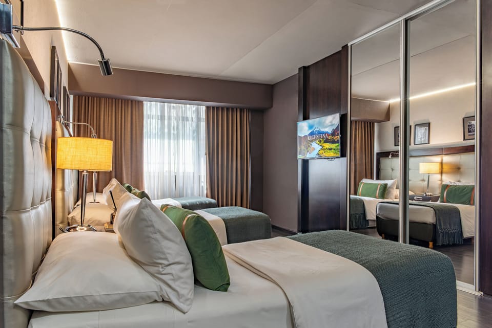 Superior Triple Room | Down comforters, minibar, in-room safe, desk