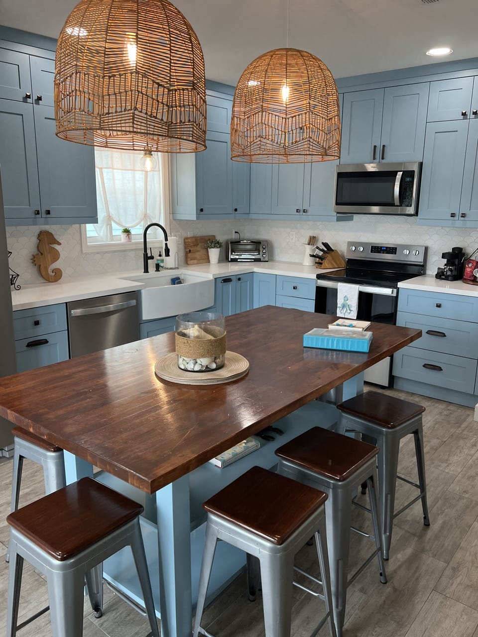 Newly renovated kitchen with large dining island. 