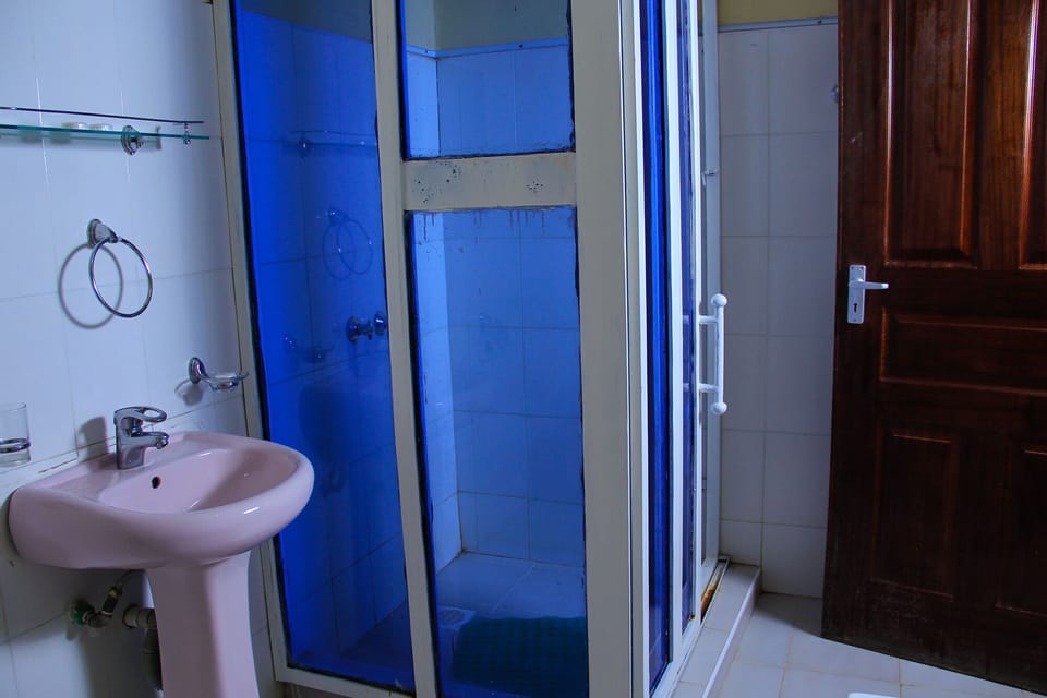 Rainfall showerhead, slippers, towels, soap