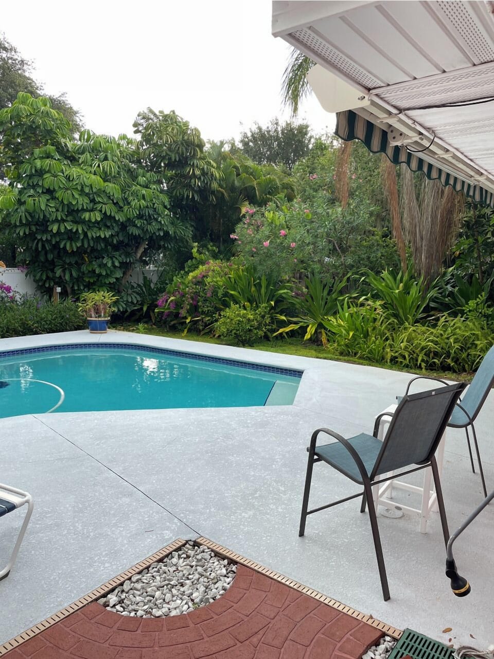HEATED  pool with hand crank awning for shade.
