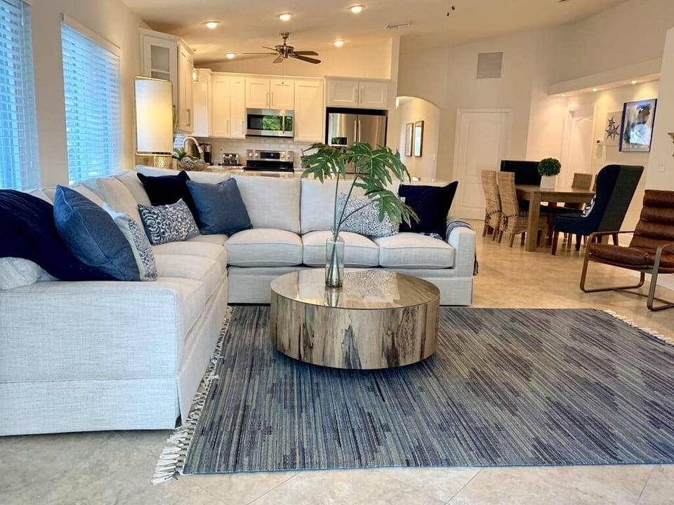 Open concept living area with new smart TV