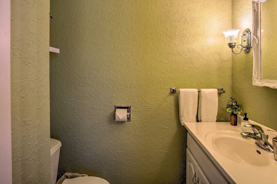Bathroom 3 is half bathroom on main floor in bedroom 1