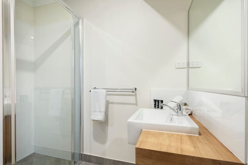 Downstairs bathroom with toilet and shower