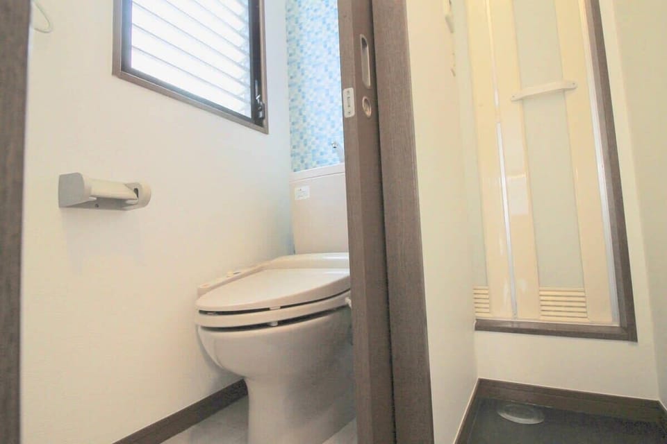 washing room toilet is spare with bathroom 