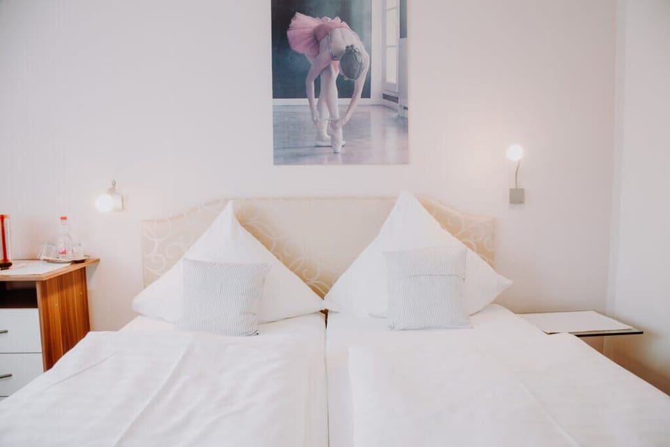 Double Room | Desk, blackout drapes, WiFi (free), bed sheets