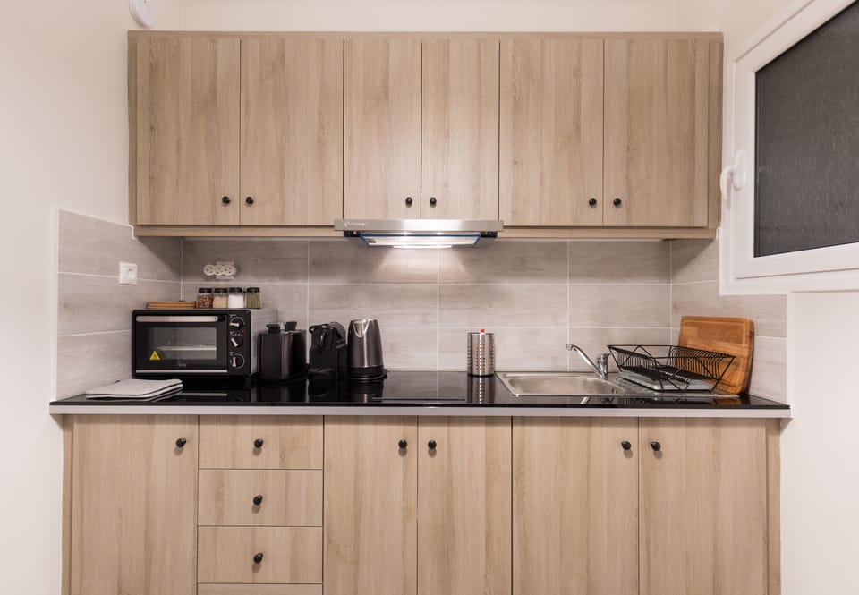 Apartment | Private kitchen | Full-size fridge, microwave, oven, stovetop