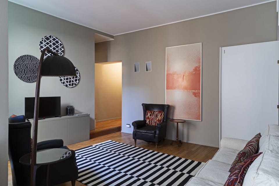 Apartment, 3 Bedrooms | Living area | Flat-screen TV, fireplace