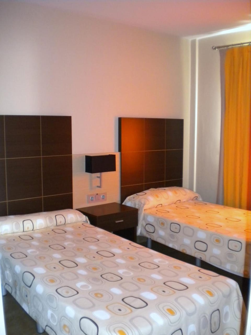 Down comforters, memory foam beds, in-room safe, iron/ironing board