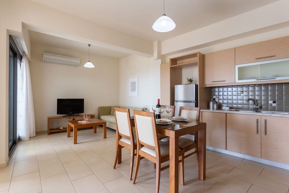 Apartment, Shared Pool  (Spermo) | Living area | Flat-screen TV