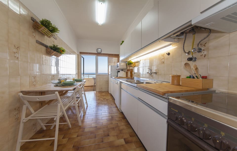 Apartment, 2 Bedrooms, Balcony | Private kitchen | Fridge, microwave, oven, stovetop