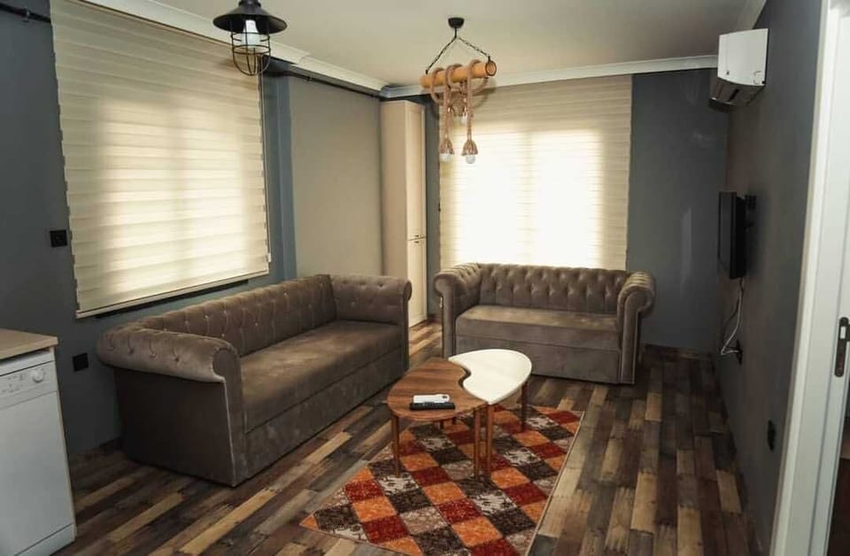 Apartment, 1 Bedroom | Living area | LCD TV