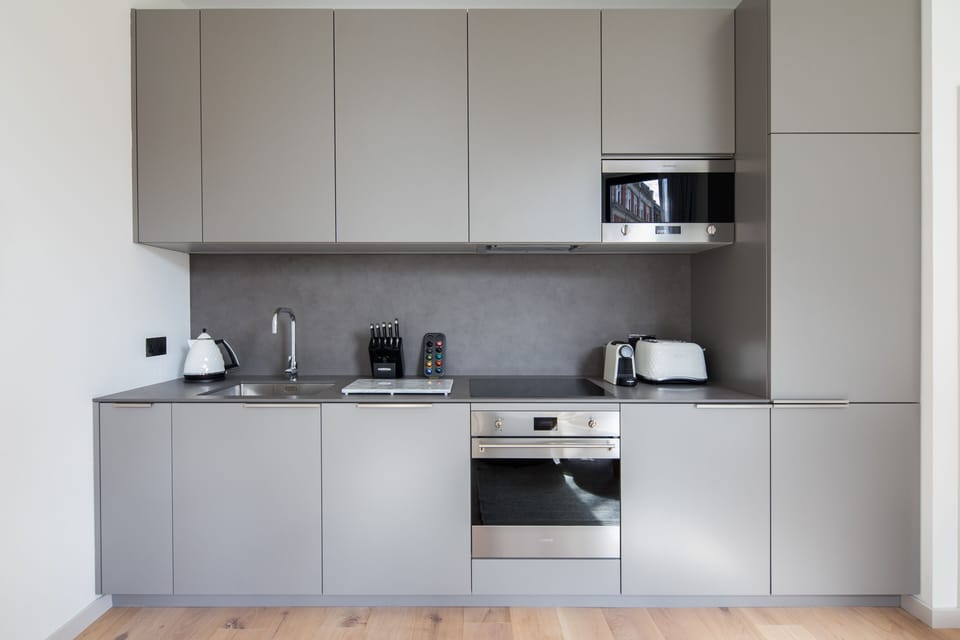 Luxury Suite, 2 Bedrooms | Private kitchen | Fridge, microwave, oven, espresso maker