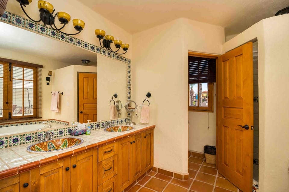Master Bathroom Upstairs, sinks, Vanity mirror, towels, hair dryer