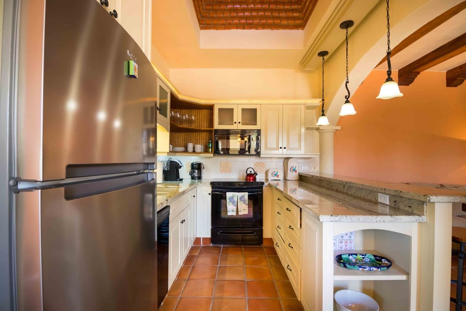 Kitchen, fully equipped, dishwasher, coffee maker, stove, Refrigerator, Microwave and larger  granite counter top