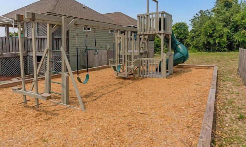 The Ships Watch Community Playground features swings, slides, and climbing structures where kids can play and explore during your stay.