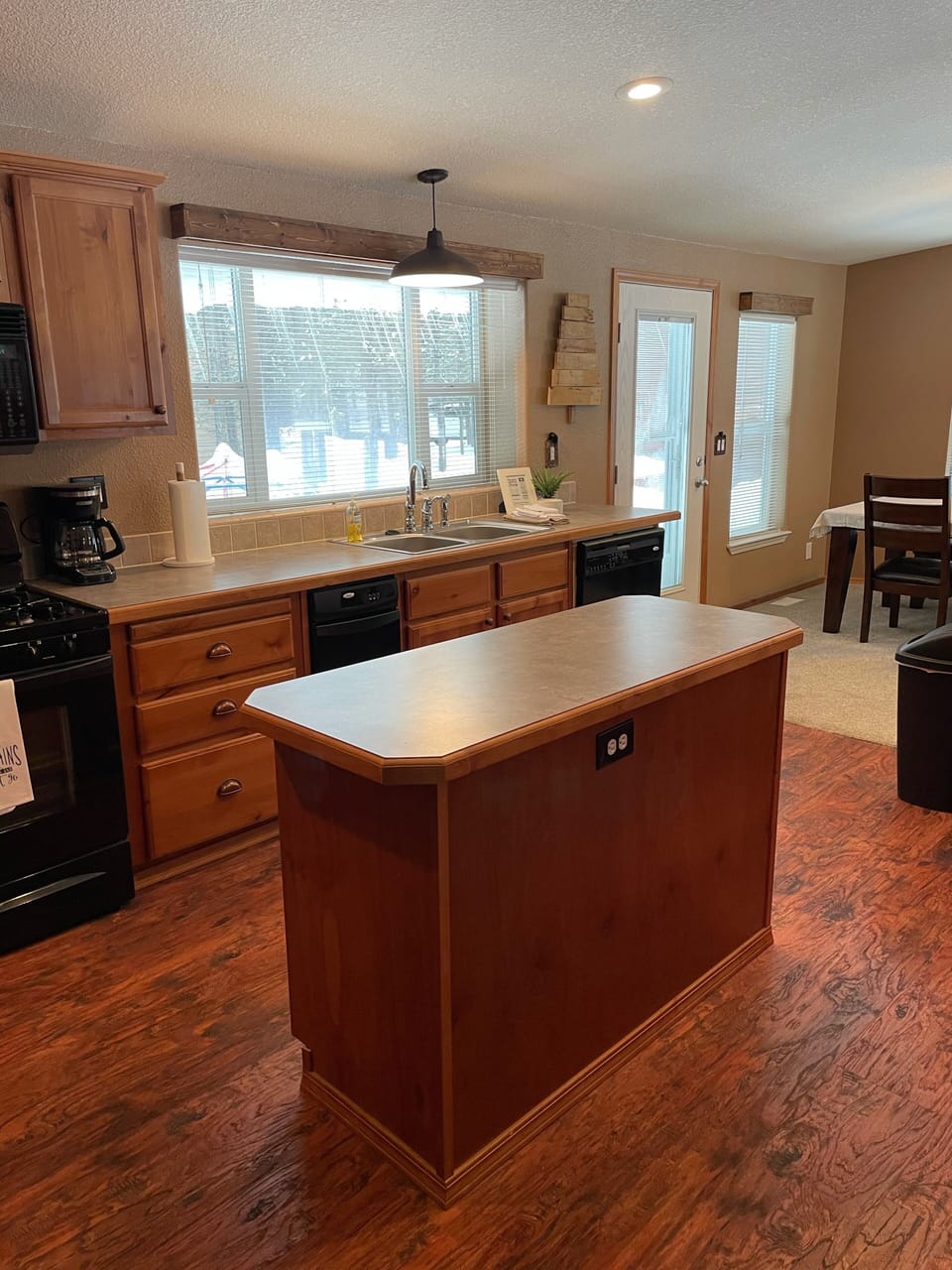 Well organized kitchen with labels to identify where items go.