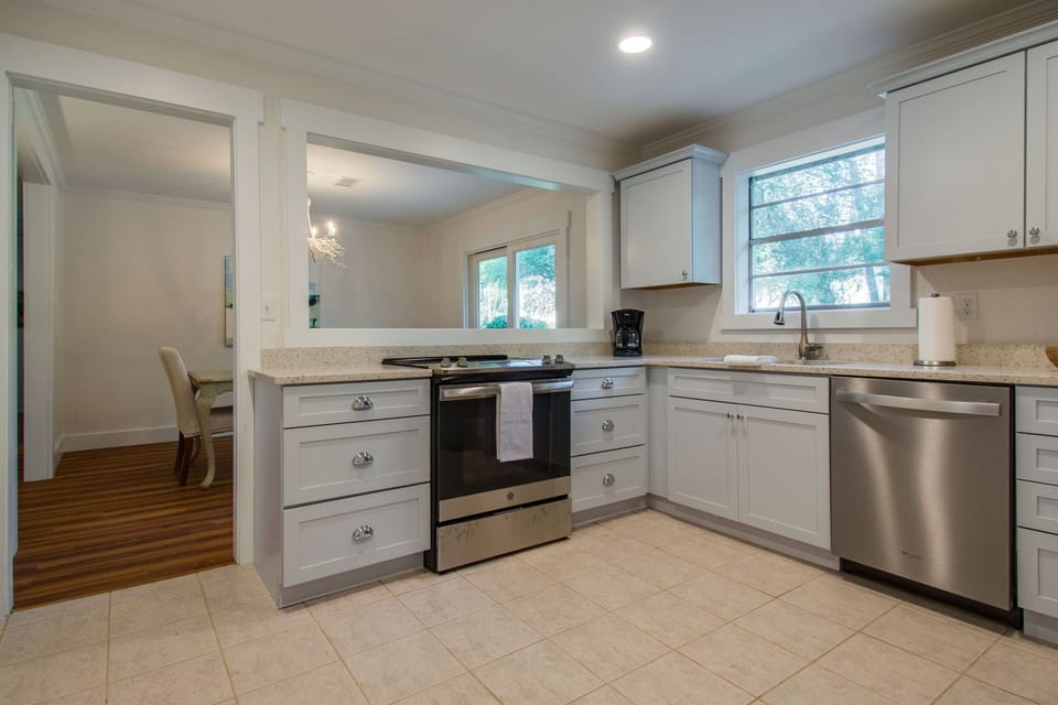 Newly remodeled kitchen with full size washer & dryer.