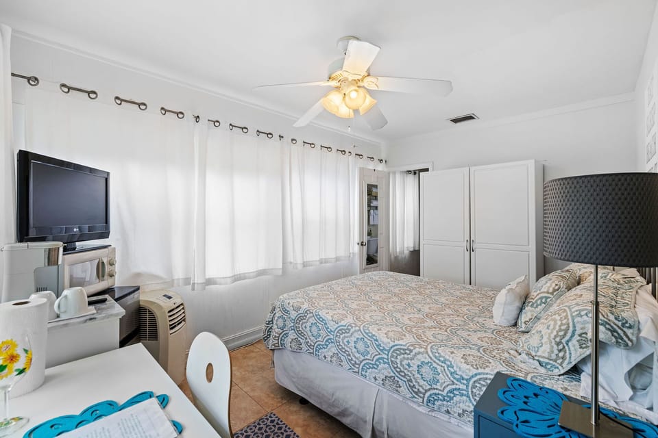 Bedroom with door to private bathroom