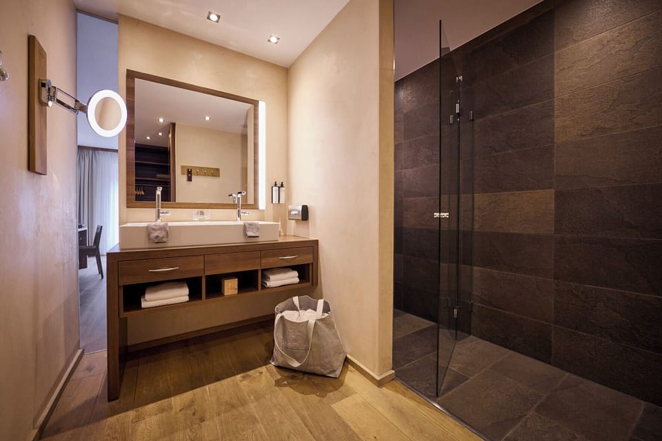 Double Room, Mountainside (DOUBLE M WALDBLICK) | Bathroom | Hair dryer, bathrobes, slippers, towels
