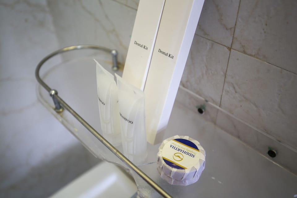 Deluxe Twin Room | Bathroom | Shower, slippers, towels